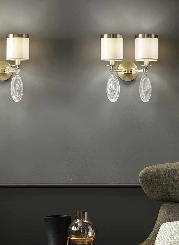 Metal frame and arms covered with glass. Crek glass pendants and satin lampshades.