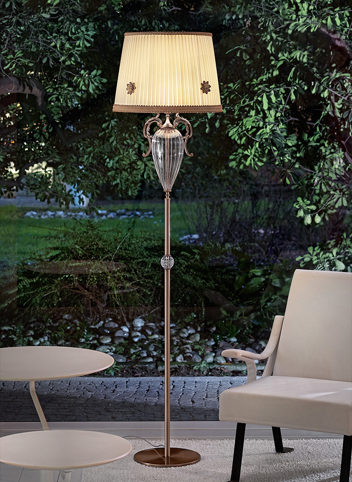 Cast brass and metal frame. Pongè lampshades