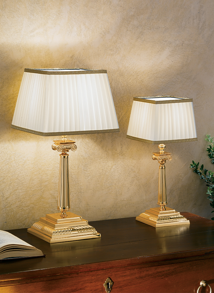 Gold plated solid brass base. Shantung lampshades